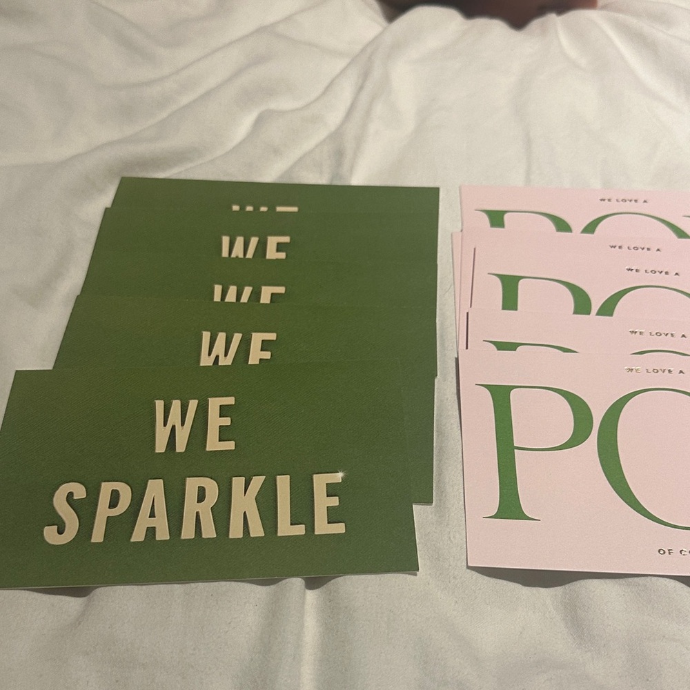 Set of 13 Green and Pink Kate spade post cards.
